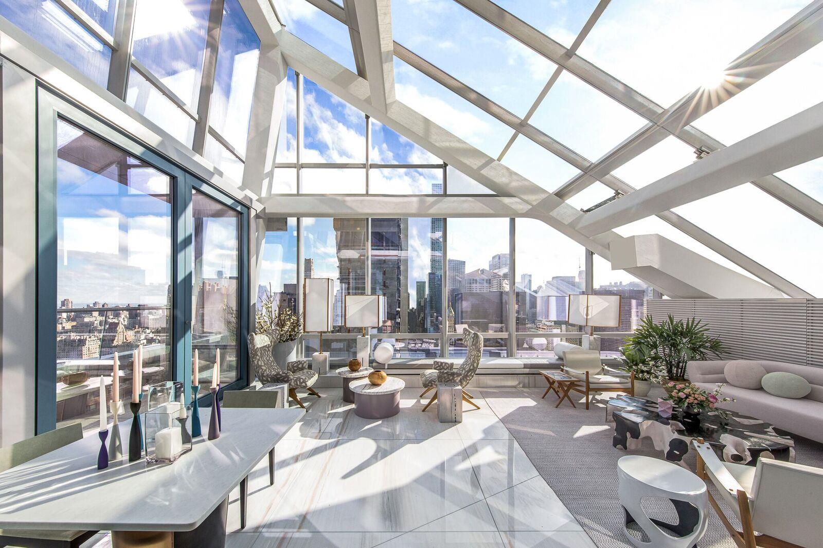 157 57th St W 41-D New York, New York Introducing the never-before-released Spring Garden Residence at 157 West 57. One of only 2 homes in the exclusive One 57 on Billionaires Row Tower to have private outdoor space on the park.This one-of-a-kind duplex condo graced with astounding views of Central Park and the New York City skyline, this 5-bedroom, 5.5-bathroom home is a masterpiece of urban luxury and craftsmanship. The residence was styled by world-renown interior designer, Katherine Newman, and it sits within the ultra-luxury One57, a residential and hotel tower in the heart of Midtown Manhattan.Beyond a spacious foyer and gallery adorned with several coat closets the home flows into an expansive, 43-ft long great room. The space features floating stain grade ceiling panels and is surrounded by wall-to-wall floor-to-ceiling windows. It leads out onto a stunning 671 sq. ft. solarium and terrace that boasts a full-length stone bench as well as a stylish screen that minimizes the clutter of exposed ducts and pipes.The eat-in kitchen is adjacent to the great room and is equipped with custom cabinetry from Smallbone of Devizes, a massive central island with integrated stools, sleek granite countertops, custom pendant lighting and cabinet pulls by Thomas Juul-Hansen, pull-out pantries, under-cabinet lighting, and a suite of high-end stainless steel appliances from Miele and Sub-Zero. Finishing the lower level are a convenient laundry room, a powder room with marble walls and floors, and a large bedroom with a trio of private closets as well as a marble en-suite with a quartzite vanity and a walk-in rain shower.The upper level contains the remaining 4 bedrooms and is accessed via a brand new wooden staircase with contemporary glass railing. The master bedroom is a sanctuary unto itself. It possesses a floating wall panel, a double door reach-in closet, a cavernous walk-in closet with custom cabinetry, and a huge marble en-suite with custom medicine cabinets, a custom double vanity from Thomas Juul-Hansen, his-and-her Duravit toilets in private stalls, a walk-in rain shower, and a separate free-standing bathtub. The remaining 3 bedrooms each have private closets, floating wall panels, and pristine en-suite bathrooms.One57 is situated just over a block from Central Park and across the street from Carnegie Hall. The building offers residents a suite of exclusive amenities that include a 24-hour doorman and concierge, state-of-the-art fitness center, yoga studio, screening and performance space, catering kitchen, private dining space, library, pet-grooming room, and an on-site garage. Additionally, residents have access to all of the luxury amenities offered by the Park Hyatt Hotel.