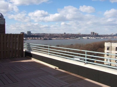 TOP OF THE WORLD TRIPLEX.  Superb 3-bedroom, 3-bath with TREMENDOUS STORAGE.  Handsome kitchen appliances, including MICROWAVE & DISHWASHER. Your very OWN PRIVATE OUTDOOR TERRACE with HUDSON RIVER VIE