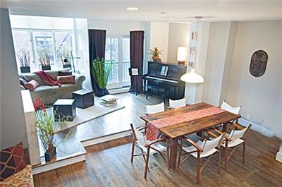 Amazing triplex loft with extra large private roofdeck, two balconies, a wonderful open chef's kitchen, 3 full bathrooms, amazing southern exposure throughout all three floors, and a woodburning firep
