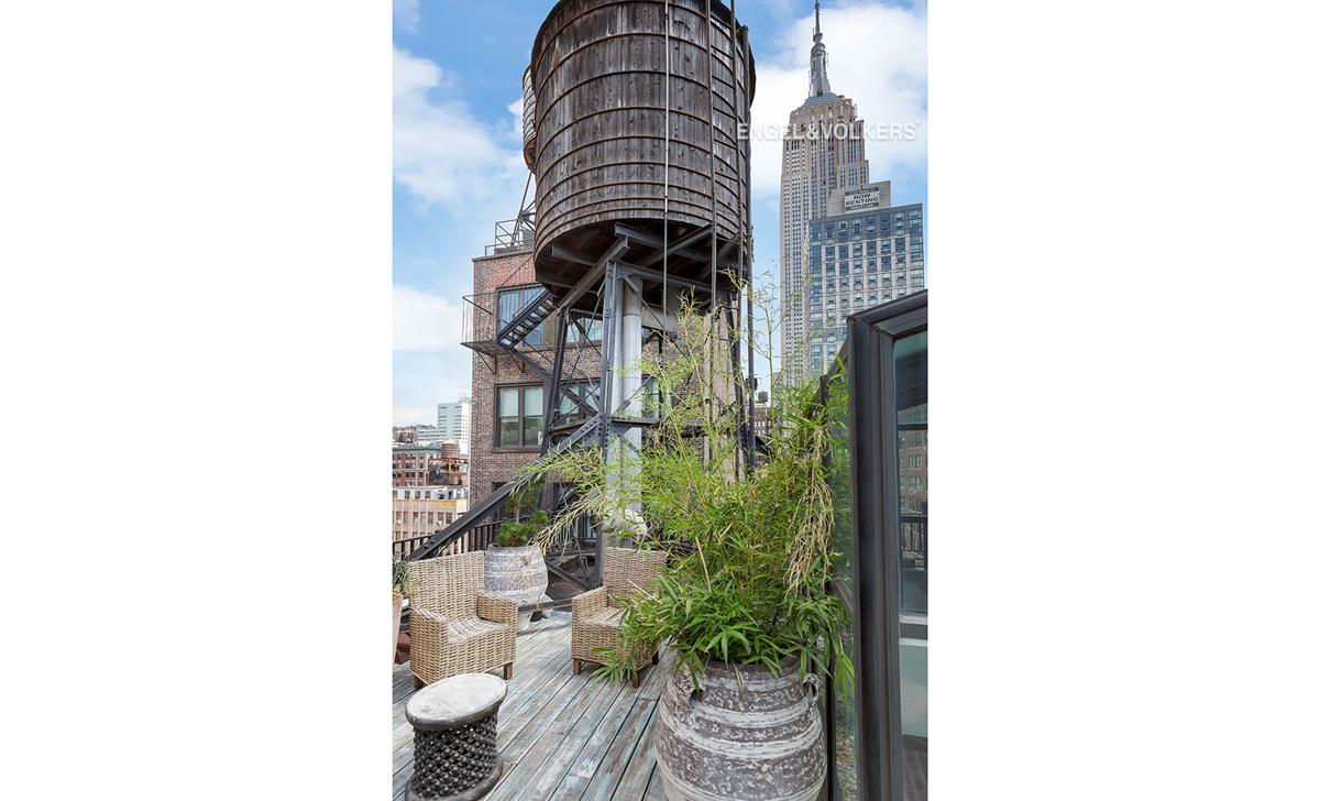 1200 Broadway PH-E New York, New York An absolute one-of a kind Penthouse loft in the historical Gilsey House, a landmark cast-iron building with prewar details and keyed elevator. This corner apartment features an enormous living room with exposed brick, a soaring skylight, and views of Empire State Building! The top-of-the line European kitchen is wide open with a spacious dining area illuminated by a second skylight. There's also a walk-in pantry and a storage room with access to more storage above in a windowed storage tower. The corner master bedroom, with sky-lit sitting/dressing room, has an en-suite spa-like bathroom with soaking tub and steam shower.The second bedroom has a beamed ceiling and original wood windows. Across the hall, with window, you have another spacious bathroom with window and washer/dryer/folding area. The lofted third bedroom(with solarium!) opens onto the private roof deck. The owner has the right to deck over the entire area over his ceilings.The apartment also has extra storage/bike space in the basement.Located directly across from the Ace Hotel, it is close to some of the best restaurants (Nomad, Breslin) and shopping (Fairway, Eataly) the city has to offer, and is convenient to transportation the 1,2,3,F,N,R,Q and W trains are just around the corner. This well-managed co-op allows live/work, pied-à-terre and co-purchasing. The building is pet-friendly.