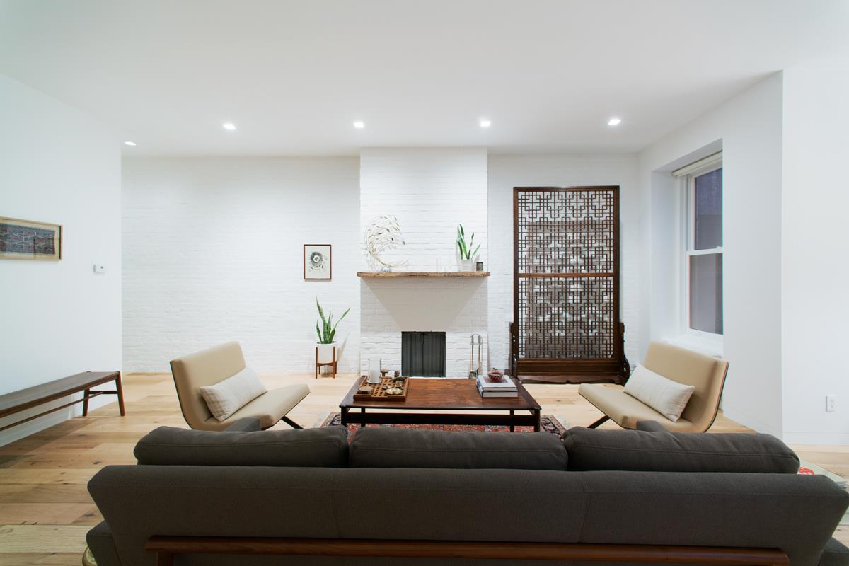 130 19th St E 3 New York, New York Own in historic Gramercy Park. This chic and meticulously renovated floor-through two bedroom, one and a half bath apartment is simply an oasis of calm. Gut renovated to perfection, this sunny 3rd floor apartment (but only 2 flights up!!) features two working fireplaces, N,S,E, W exposures, 10 ceilings, painted white exposed brick wall along entire length of apartment, custom millwork, 7"wide plank reclaimed solid oak wood floors, open kitchen with white quartz countertop & waterfall edge, white lacquer cabinets, Bertazzoni stove top with convection oven, Blomberg refrigerator, built in water filter, floor to ceiling custom bedroom closets, brand new Marvin windows throughout the apartment, Cityquiet windows in the master bedroom, a Runtal radiator in living room, full size Bosch Axxis washer and dryer, & architecturally sleek Element LED Wall Wash Downlight ceiling fixtures. Often referred to as Block Beautiful, this historic stretch of 19th Street is one of the most picturesque blocks in Manhattan. Actresses Theda Bara, Lillian and Dorothy Gish, Ethel Barrymore and Helen Hayes are all said to have lived here at one time or another. 130 East 19th Street is a four-unit walk up cooperative built in 1876. Central to nearly everything, including all transportation, coveted restaurants, gourmet food shopping, and the world-famous Union Square farmer's market, the opportunity to live in this very special building should not be missed.