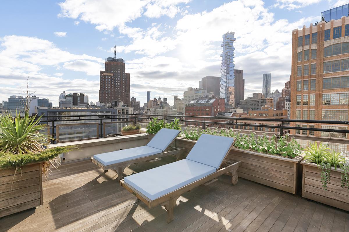 161 Hudson St 8\9C New York, New York DUPLEX PENTHOUSE DREAMThis one-of-a-kind two bed, two and a half bath duplex is flooded with sunlight from all sides. In the heart of Tribeca, boasting approximately 1,000 square feet of private outdoor space, split between the patio, roof deck, and garden, this is the perfect home to entertain.Enter the apartment to massive double height ceilings and vast sunlight that pours in from windows on both floors. The attention to detail can be seen throughout the home, starting with the entrance where you are greeted by beautiful American Walnut floors. Ample dining space adjacent to the expansive living room allows for large scale parties as well as intimate private gatherings. The stainless-steel kitchen is every chefs dream, with top of the line Viking appliances including two dishwashers, two ovens, two sinks, a range top grill, and much more. The master bedroom, located on the first floor, has gorgeous custom built-in storage and an en-suite bathroom.Walk up the grand staircase to be greeted by magnificent city views through grand floor to ceiling windows. The upstairs bedroom has an en-suite bathroom as well, and looks out onto the private garden.This apartment offers three incredible outdoor spaces. The garden, which is just outside of the bedroom on the second floor of the duplex, is completely private with walls on all four sides offering the utmost tranquility. The patio, also on the second floor, has a BBQ and large entertaining and dining area. Lastly, up the outdoor spiral staircase you will find the private roof deck, with unmatched open views of Tribeca.A temperature controlled wine cellar, laundry room, wood-burning fireplace, and surround-sound Sonos system are just some of the other incredible features included in this home.161 Hudson is a boutique, loft-style condominium located in the heart of Tribeca. With public transportation in close proximity (1, A, C, E, N, Q, R, W, 6, J, Z), as well as the Hudson River Park and all of the dining and nightlife downtown Manhattan has to offer. The building has a part time doorman (M-F 8am-8pm, S-S 11am-8pm), allows for pieds-a-terre, and is pet friendly. this is a co-exclusive with R. New York.*Partial Virtual Staging*