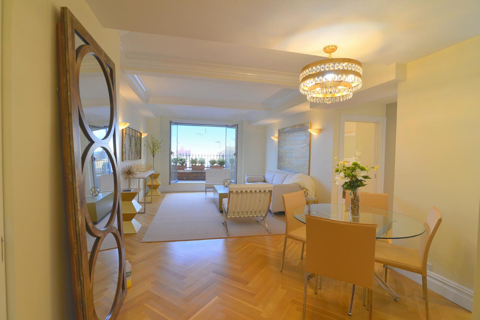 23 73rd St W 914 New York, New York THE RESIDENCEThis masterpiece two-bedroom with magical 36 foot terrace and stunning city views is truly for the most discriminating buyer who wants only the best! Located in the finest West Side neighborhood, just steps to Central Park, you will fall in love with this dazzling and lofty residence with an extraordinary new renovation. As you enter the homes grand foyer with Venetian plaster ceiling and designer lighting, you are greeted with a breathtaking and expansive 25 foot living and dining room that is perfect for glamorous entertaining. Huge single-pane terrace doors lead out to your private outdoor oasis that spans the entire apartment. The spectacular and large new eat-in kitchen boasts gorgeous European custom cabinetry with all the bells and whistles to satisfy the most discerning gourmet chef, including a Sub Zero refrigerator, a Miele dishwasher and washer/dryer, and Calacatta Gold marble countertops and backsplash. The master bedroom is luxuriously large with an enormous walk-in closet, and the corner second bedroom is perfect for children or guests. Other incomparable features include two new masterful marble bathrooms with exceptional fixtures, gorgeous herringbone oak floors, central air-conditioning, lofty 9 foot ceilings, stunning crown moldings, incredible closets throughout, designer lighting, and more. This one-of-a-kind jewel combines classic prewar with contemporary amenities and style. You can have it all -- with dreamy indoor and outdoor living, the best address and building, this remarkable rarity is your dream come true.THE BUILDINGAll this splendor in an iconic prewar building, The Park Royal, that was designed by the renowned architect, George F. Pelham, and built in 1926. The majestic landmark affords its residents the most outstanding white glove service including a 24 hour doorman and concierge, New York Sports Club off the glamorous lobby, bicycle room just steps from the sidewalk, childrens playroom, storage lockers, Wi-Fi, and a pet friendly environment. In addition, this premier West Side address offers world-class dining, shopping, culture and transportation right outside your door. Co-purchasers and pied-a-terres are permitted on a case-by-case basis, and subletting is allowed, as well. THE FEATURESBREATHTAKING LAYOUT with incomparable renovationspectacular 36 foot terrace spans entire homeSWEEPING CITY PANORAMASEXQUISITE NEW eat-in KITCHENtop-of-the-line appliancesSTUNNING NEW marble BATHROOMSluxurious rooms & dazzling foyergorgeous new herringbone oak floorsCENTRAL AIR-CONDITIONING9 foot ceilings & crown moldingsfantastic closets including 2 walk-insreasonable MAINTENANCE includes electricWASHER/DRYERNEW YORK SPORTS CLUB IN BUILDINGPRIVATE STORAGE LOCKERSCHILDREN'S PLAYROOMPIED-A-TERRE OK - CASE BY CASE BASISPET FRIENDLY24 HOUR DOORMAN & CONCIERGEICONIC LANDMARK BUILDINGPREMIER LOCATION OFF CPW