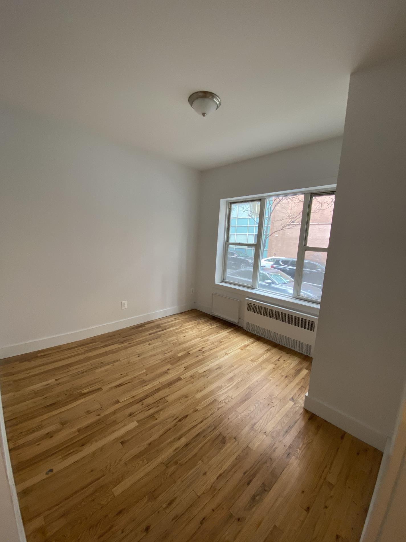 450 West 58th Street 1-j, #1J