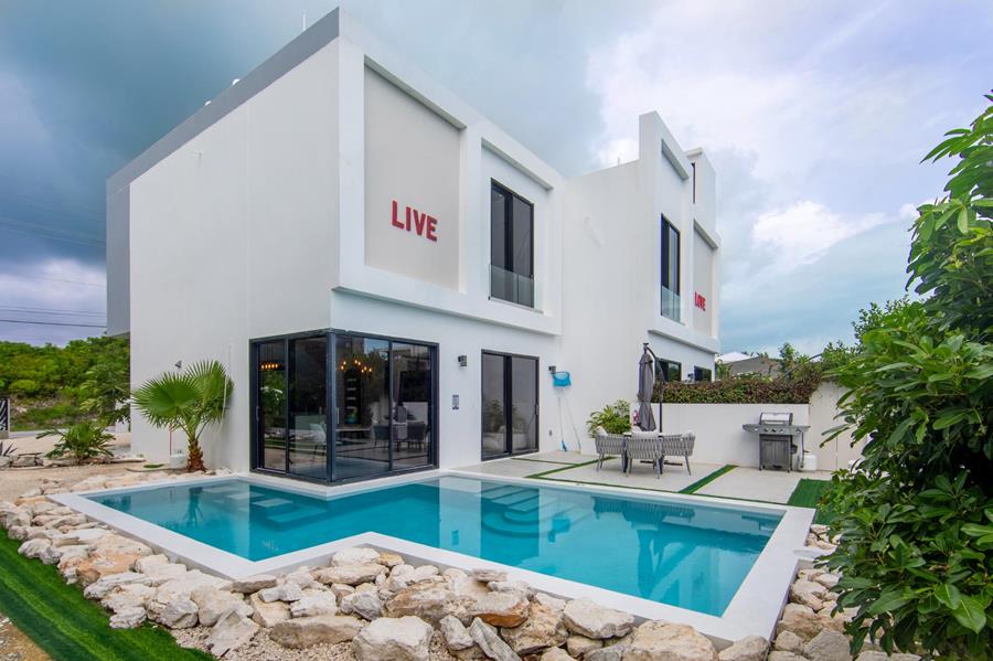 June Plum Road Out of NYC Grace Bay Providenciales