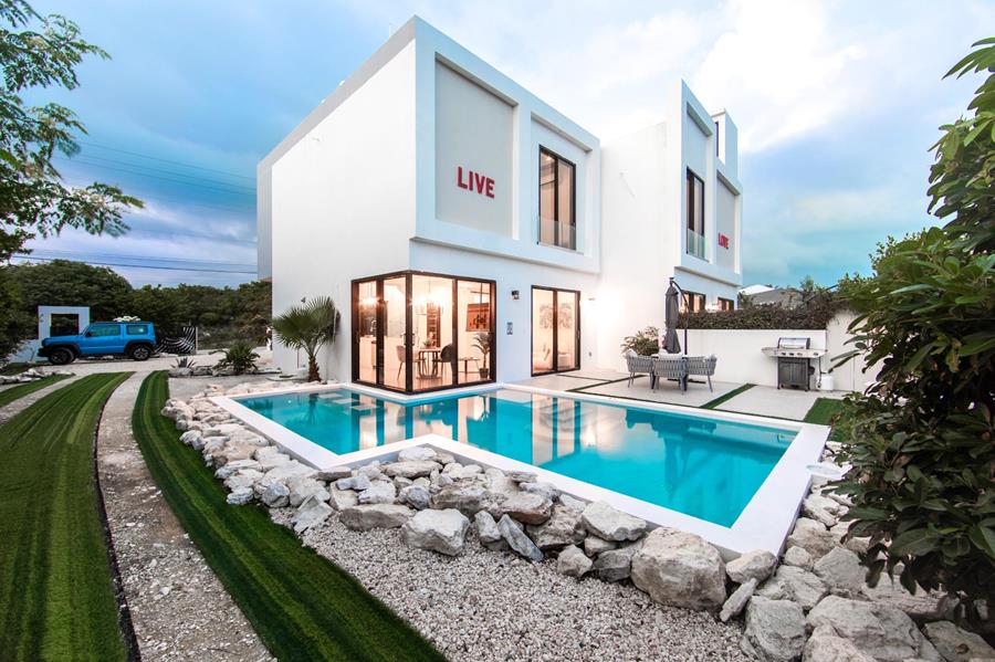 June Plum Road Out of NYC Grace Bay Providenciales