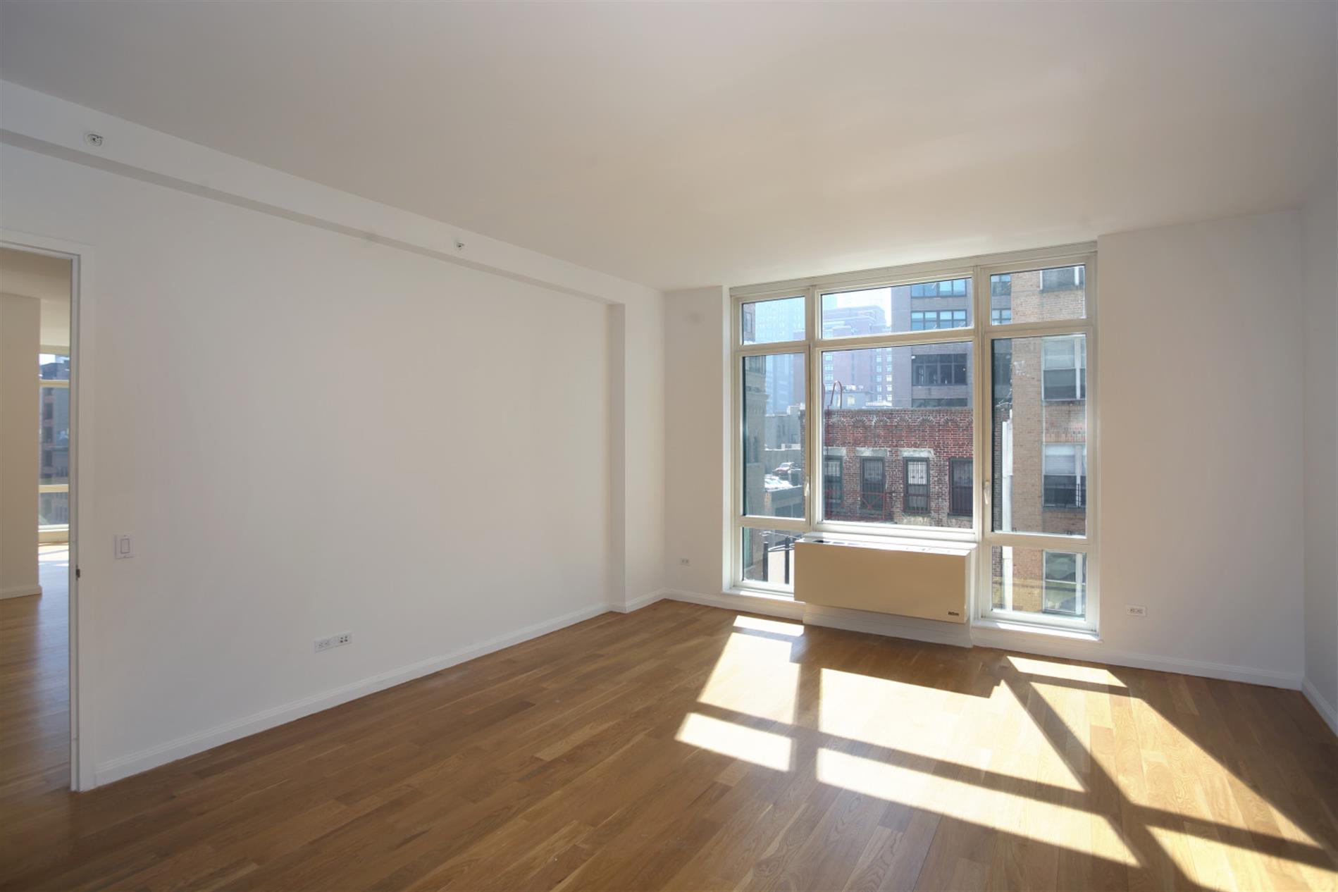 Sunlit SoHo 2BR/2BA with Floor-to-Ceiling Windows